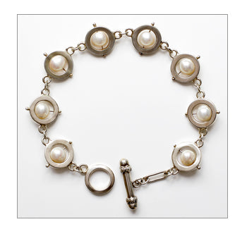 Saturn Bracelet with White Pearls